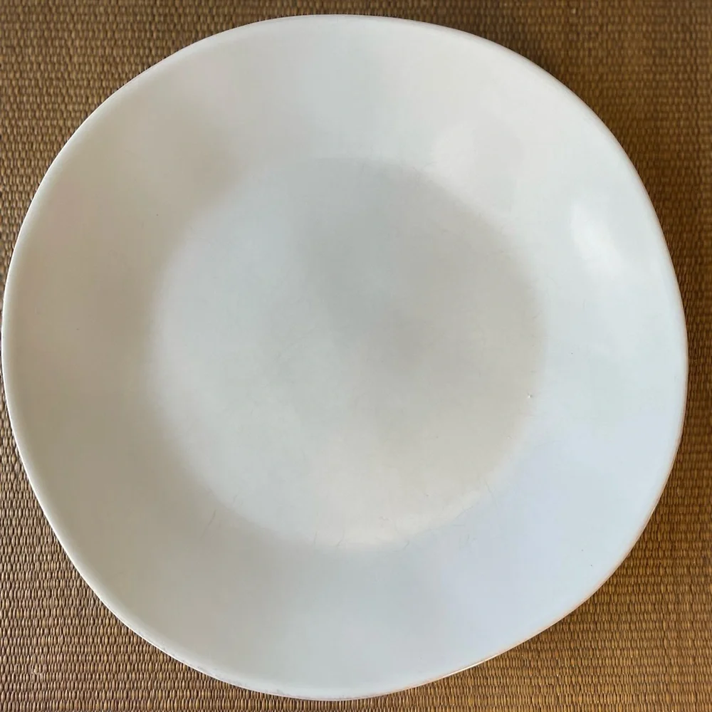 Crate & Barrel white organic wavy dinner plate